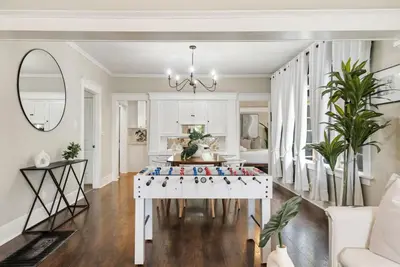 a living room with a ping pong table at Sunset Shores - Near the beach - Games - Sleeps 8 in Long Beach