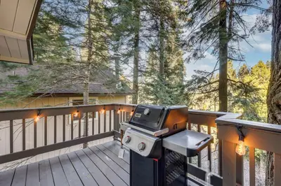 a grill on a deck on a porch at 3 Mi to Lake Arrowhead Village Pine-View Home! in Lake Arrowhead