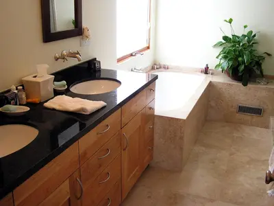 a bathroom with two sinks and a large bath tub at Venice Canals Contemporary, unique wildlife, amazing reviews in Los Angeles