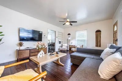 a living room with a couch and a table at 3BR Santa Monica Home, Ideal for Groups! in Los Angeles