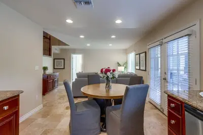 a kitchen and dining room with a table and chairs at Beautiful Backyard Oasis 5 bedroom 3 Bathroom Home in Placentia