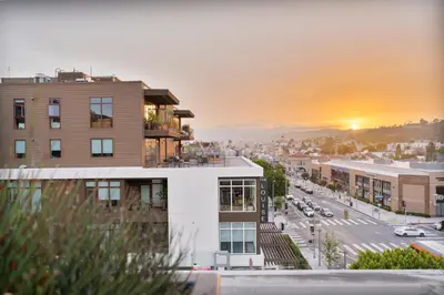 a view of a city street with a building at Glam by the Hollywood Sign 2 Bed Apt WITH FREE EV PARKING, Pool, Gym in Los Angeles
