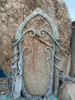 a sculpture of a tree on a rock at Lord of the rings palice in Wofford Heights