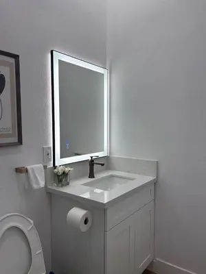a white bathroom with a sink and a mirror at #Marbella Lane - Stylish Haven Near City Center in Long Beach