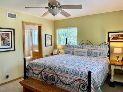a bedroom with a bed and a ceiling fan at Cozy Guesthouse with Private Pool and Heated Jacuzzi in Santa Clarita