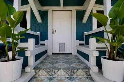 a front door of a house with plants at Bougainvillea Bungalow Peaceful Venice Retreat in Los Angeles