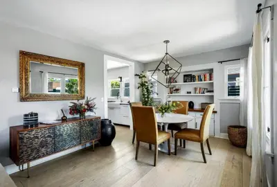 a kitchen and dining room with a table and chairs at Venice Gem Private Beach Bungalow in Los Angeles