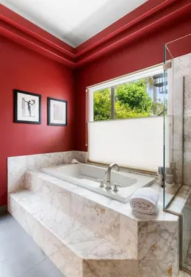 a bathroom with a large tub and a window at Oceanview Coastal Retreat in Redondo Beach in Redondo Beach