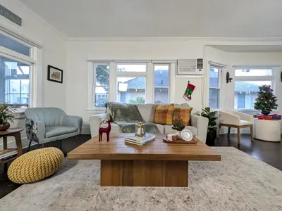 a living room with a couch and a coffee table at Spa, Parking, King Bd, Desk, 7 Min Walk to Beach in Long Beach
