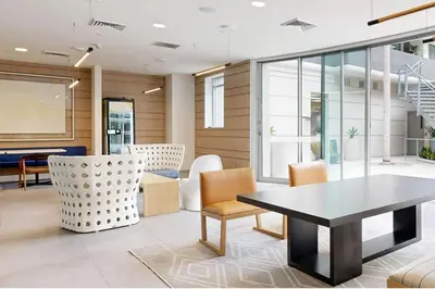 a dining room with a table and chairs at Blueground Venice pool wd nr beach LAX-1329 in Los Angeles