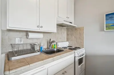 a kitchen with a sink and a stove at Beautiful 1 Bed Beach Balcony Condo #207 in Carpinteria