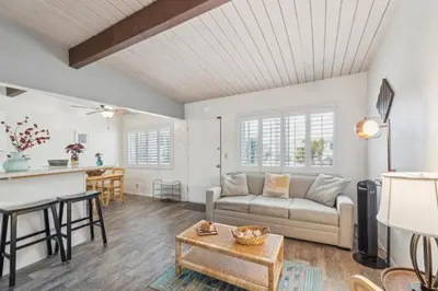 a living room with a couch and a table at Beautiful 1 Bed Beach Condo #224 in Carpinteria
