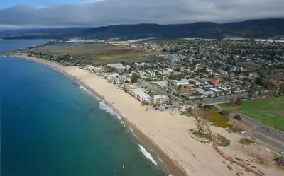 an aerial view of a beach and the ocean at Full 1 Bed Beach Condo #227 in Carpinteria