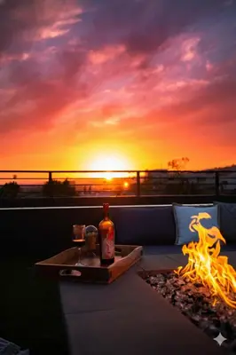 a bottle of alcohol sitting on a table next to a fire at NEW Modern Oasis off Melrose - Rooftop - Pool in Los Angeles