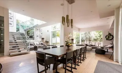 a dining room with a large table and chairs at Stunning Home - Pool & Hot Tub - Fire Pit in Los Angeles