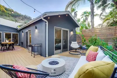 a patio with a couch and a table at Projector - Pool Table - 15min DT - Pets OK - BBQ in Los Angeles