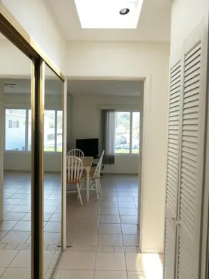 a view from the living room into the dining room at 4902 Sandyland Road #247 in Carpinteria