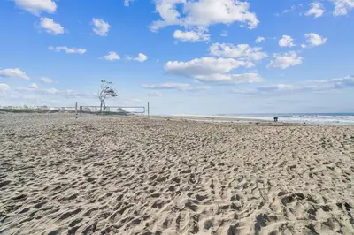 a sandy beach with a soccer ball and a goal at 4980 Sandyland Road #215 in Carpinteria