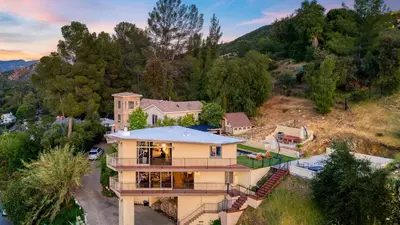 an aerial view of a house at Designer Retreat w Pool Firepits Panoramic Views The Lake House at Malibu in Agoura Hills