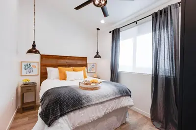 a bedroom with a bed with a basket on it at New and Modern Casita VIP in San Dimas