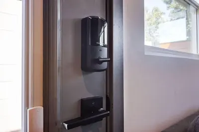 an open door with a tv on the side of it at New and Modern Casita VIP in San Dimas