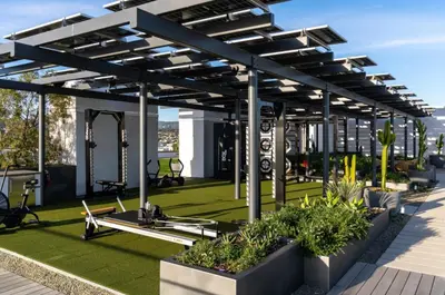 a gym on the roof of a building with plants at The Diamond Dune Three floors Two Balconies BBQ in Los Angeles