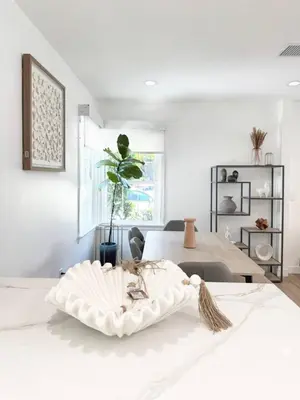 a white bedroom with a white bed and a table at Bright and Chic 3BR-3BA by Century City - FH-BV in Los Angeles