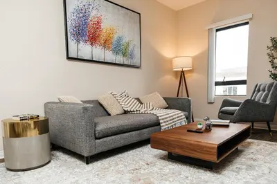 a living room with a couch and a coffee table at Stunning 2 bedroom near by The Grove in Los Angeles