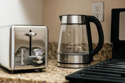 a coffee maker sitting on a counter next to a toaster at Stunning 2 bedroom near by The Grove in Los Angeles