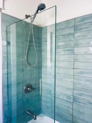 a shower with a glass door in a bathroom at Honeywood in Hollywood! in Los Angeles