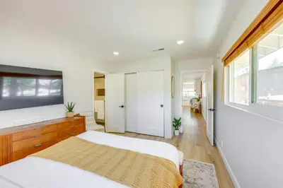 a bedroom with two beds and a window at Walk to The Village ShopsandEats Big Bear Lake Home in Big Bear Lake