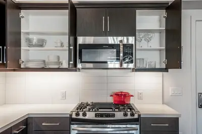 a kitchen with a stove and a microwave at Culver City 1BR w Pool Gym WD nr Downtown LAX-173 in Los Angeles