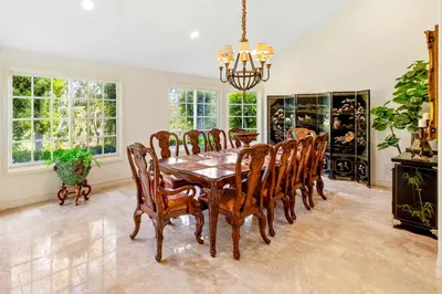a dining room with a table and chairs at #Marbella Lane - Tranquil Country Escape Getaway in Placentia
