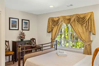 a bedroom with a bed and a window at #Marbella Lane - Tranquil Country Escape Getaway in Placentia