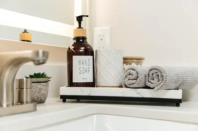 a bottle of wine sitting on a shelf above a kitchen sink at Stunning 2BR apartment steps from Santa Monica pier in Los Angeles