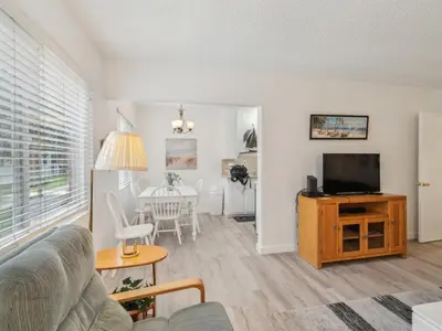 a living room with a couch and a television at Beautiful 2 Bed Beach Getaway #115 condo in Carpinteria