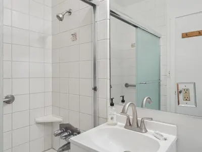 a bathroom with a sink and a shower at Beautiful 2 Bed Beach Getaway #115 condo in Carpinteria