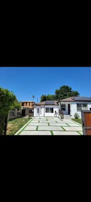 a view of a large courtyard with a building at WG House Winnetka Los Angeles in Winnetka