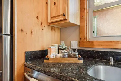 a kitchen with a counter top and a sink at Alpine Crest in Big Bear Lake in Big Bear Lake
