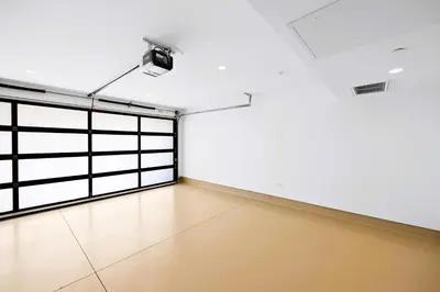 an empty room with a large window and a spotlight at Serene Hollywood in Los Angeles