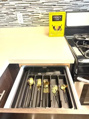 a drawer with forks and spoons in a kitchen at Heart of Koreatwon, 1Bed Studio in Los Angeles