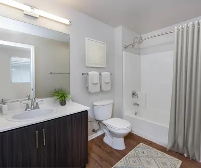 a bathroom with a toilet and a sink and a shower at Deluxe Living in Marina Del Rey - Pool, Hot Tub, Gym in Los Angeles