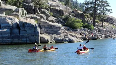 a group of people in kayaks on a river at Walk to Village & Alpine Slide - Almost a View in Big Bear Lake