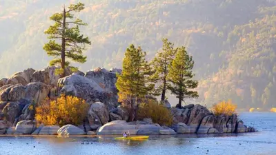 a person in a kayak on a body of water at Walk to Village & Alpine Slide - Almost a View in Big Bear Lake