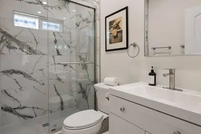 a bathroom with a shower and a toilet and a sink at Darth Vaders Lair - 10 mins to Disney - Sleeps 6 in Anaheim