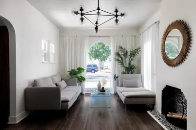 a living room with two couches and a mirror at Iconic LACasita -FoodieBobaliciousCity- Mins2DTLA in Alhambra