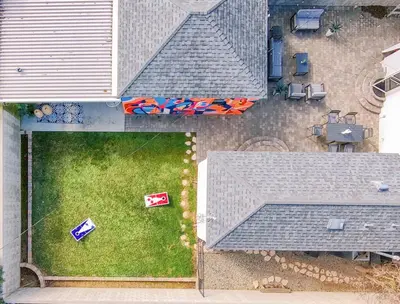 an overhead view of a yard with umbrellas on the grass at Luxury Hangout - Private Spa - Game Room - Arcade in Long Beach