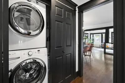 a laundry room with a washer and dryer in a house at HGTV Featured Modern Craftsman Mins2Beach GameRm in Long Beach