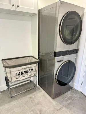 a washer and dryer in a kitchen with a cart at Woodland Hills 1 Bedroom Getaway in Woodland Hills