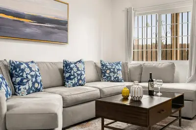 a living room with a couch and a coffee table at Casa Lanzit - 35 Percent Off March 2026! in Los Angeles